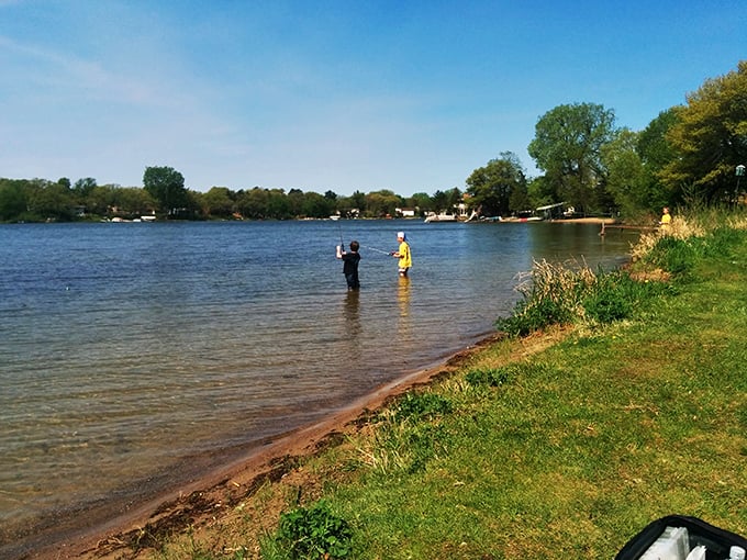 Fishing or standing in water? Either way, these folks have mastered the art of looking busy while doing nothing.