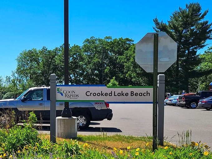 The sign says Crooked Lake Beach, but there's nothing crooked about this slice of paradise.