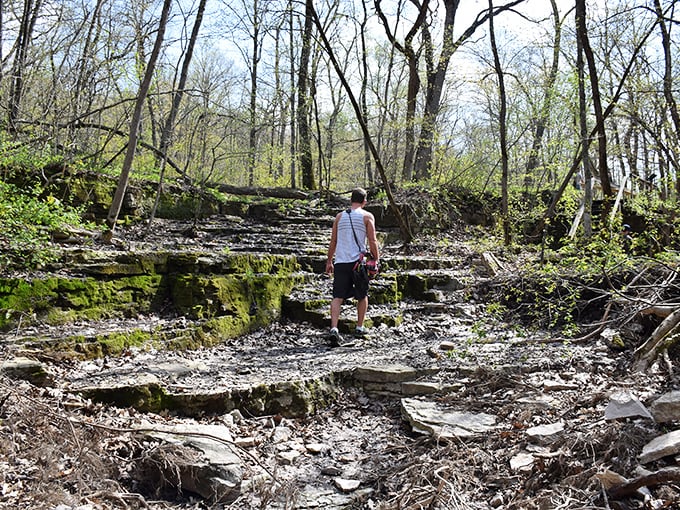 Who needs a StairMaster? This hiker's tackling nature's own rocky treadmill, burning calories and building suspense with each step.