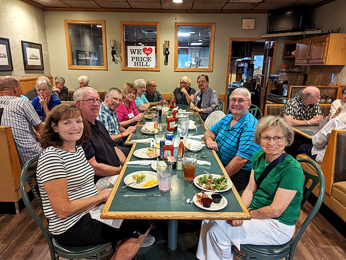 Happy faces and full plates – the universal language of a great diner. These folks look ready to solve the world's problems over pie.