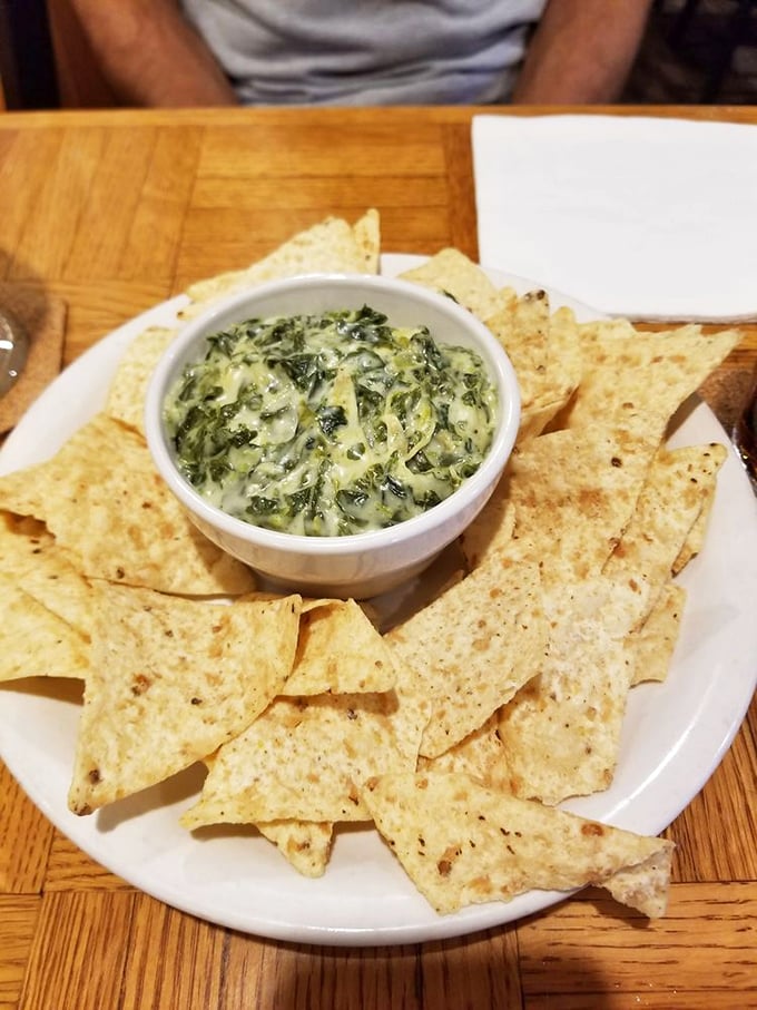 Spinach and artichoke dip: The unsung hero of appetizers. It's like a warm, cheesy hug for your taste buds.