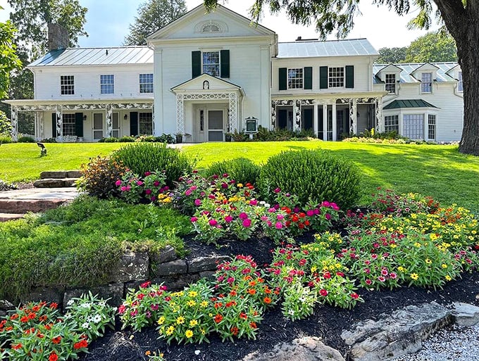 Flower power meets Southern charm! This grand white mansion could give Tara from 