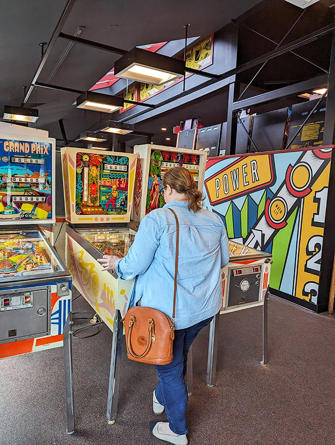 Lost in the game, this player's probably thinking, "Just one more quarter, and I'll beat the high score!" We've all been there.