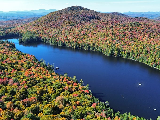 Bird's eye candy! From up here, Kettle Pond looks like a sapphire nestled in a treasure chest of autumn gold.