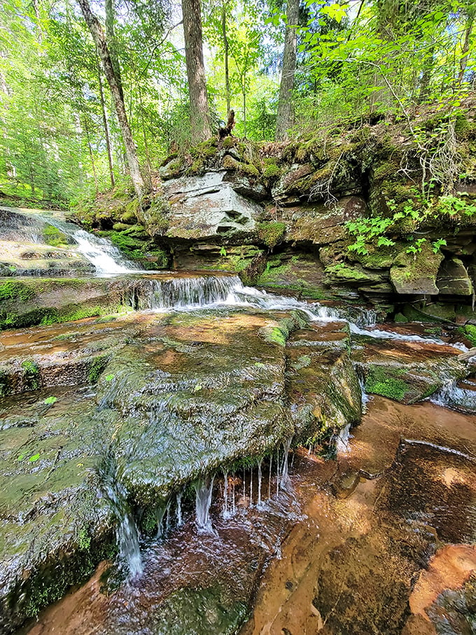 Step into nature's own staircase! These cascading waters create a mesmerizing pattern that's part geology lesson, part visual feast.