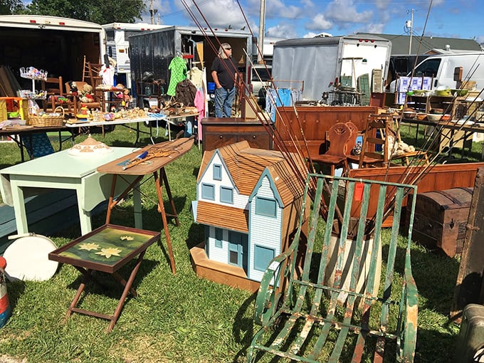 Home sweet hodgepodge! From miniature houses to weathered chairs, this booth is a DIY decorator's dream come true.