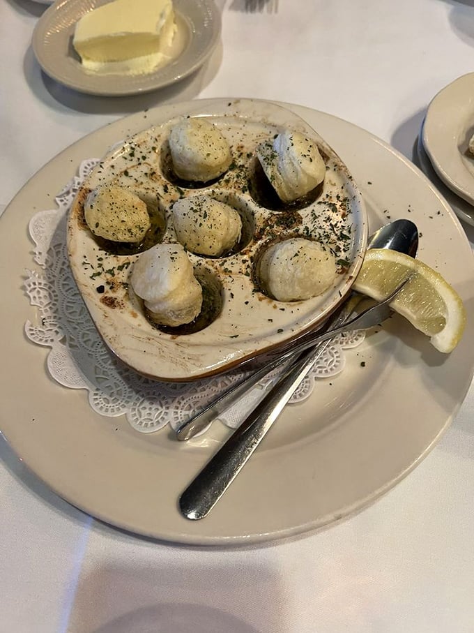 Escargot: Tiny French delicacies that prove sometimes the best things come in small, buttery, garlicky packages. Slow food at its finest!