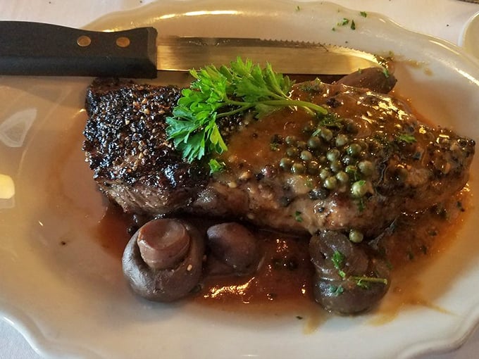 Steak au Poivre: Where pepper meets beef in a flavor explosion that'll make your taste buds do a happy dance. Fork and knife required, bib optional.