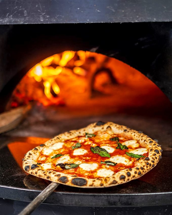 Margherita, oh my sweeta! This pizza looks so fresh, it might just start speaking Italian to you.