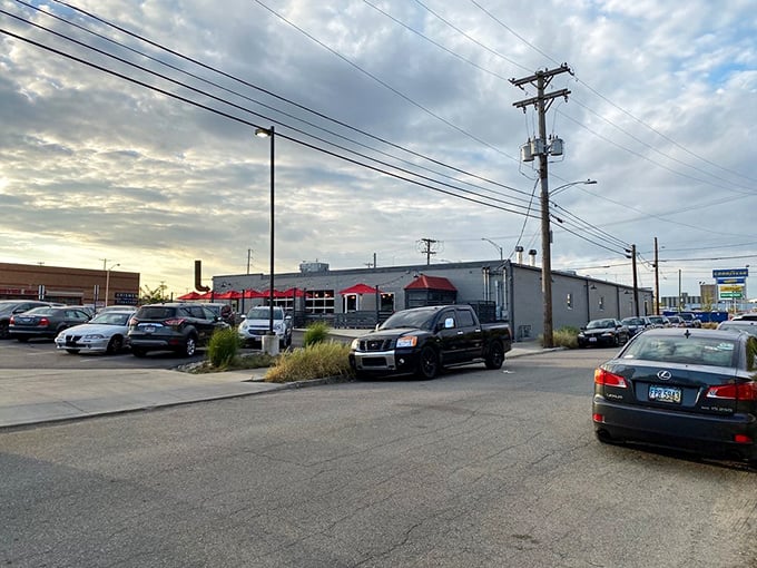 Pizza pilgrimage parking! Even the lot looks inviting—it's like a red carpet for your car, leading to cheesy bliss.