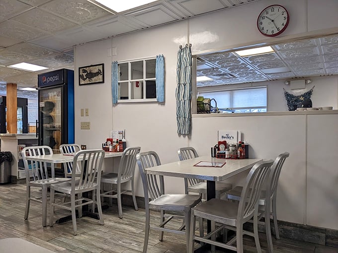 Classic aluminum chairs and nautical-themed decor create the perfect backdrop for morning coffee and local gossip at this Portland institution. Photo credit: daniel deutsch