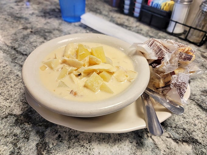 Creamy clam chowder that warms the soul, dotted with tender potatoes and carrying whispers of the Atlantic. Photo credit: Whistlebloer