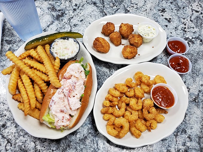 A spread that tells the whole story: fresh seafood, crispy sides, and the kind of portions that make doggy bags obsolete. Photo credit: Huy Tran