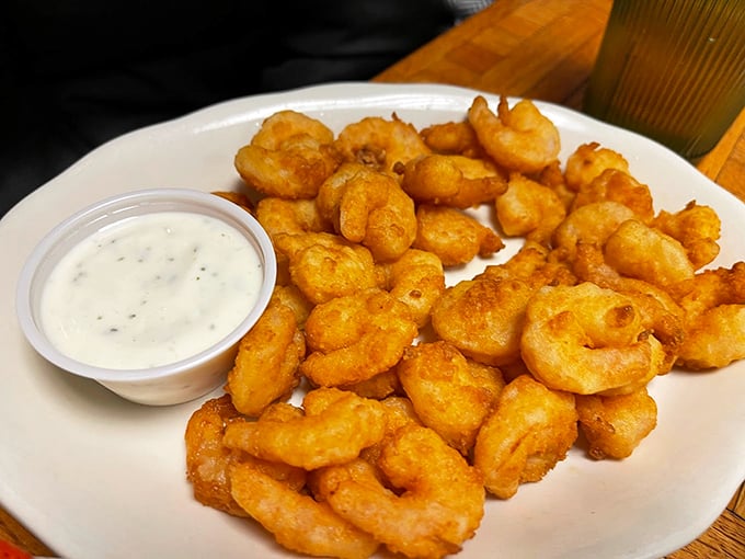 Golden-fried shrimp that crunch like tiny treasures, served with a side of house-made tartar sauce. Photo credit: Quarter Bill