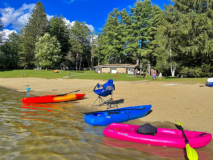 A rainbow of kayaks awaits adventure on Lake Shaftsbury's shore. It's like picking your favorite crayon, only this time you get to float on it.