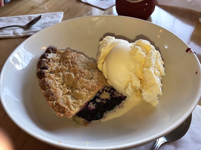 Homestyle blueberry pie meets vanilla ice cream in a dessert partnership that would make Maine's wild blueberries proud. Photo credit: Michael Madding