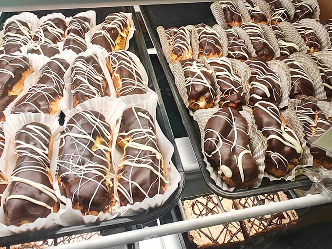 Eclairs that could make a Parisian weep with joy. These chocolate-draped delights are dressed up fancier than I am on most days. Photo credit: Mark Heydenburg