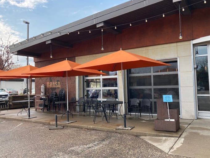 Orange you glad they chose this color? Brasa's vibrant exterior hints at the bold flavors waiting inside. Prepare for a comfort food fiesta! Photo credit: Faith