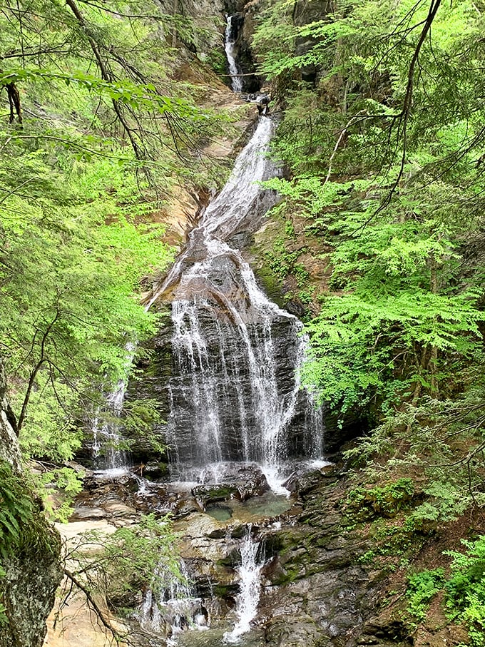 Nature's own spa: Moss Glen Falls cascades down in a misty spectacle, offering a free (and chilly) natural shower for the adventurous.