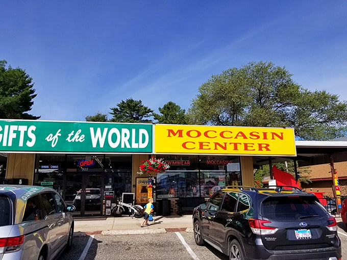 Gifts of the World & Moccasins: Where global meets local. This storefront promises a world tour with comfy feet!