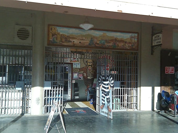 Step right up to the quirkiest entrance in Yuma! It's like walking into a John Wayne movie – if John Wayne loved cheeseburgers and neon signs.