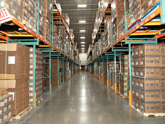 Boxes, boxes everywhere, but not a cone to eat! This warehouse is like Fort Knox for ice cream enthusiasts.