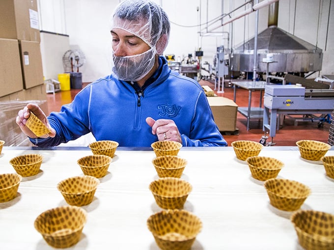 Quality control never tasted so good! This cone connoisseur ensures each waffle meets the gold(en brown) standard.