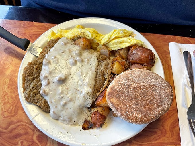 Country fried steak: where comfort food meets cardiac arrest. But with gravy this good, who's counting calories? Your cardiologist can wait.