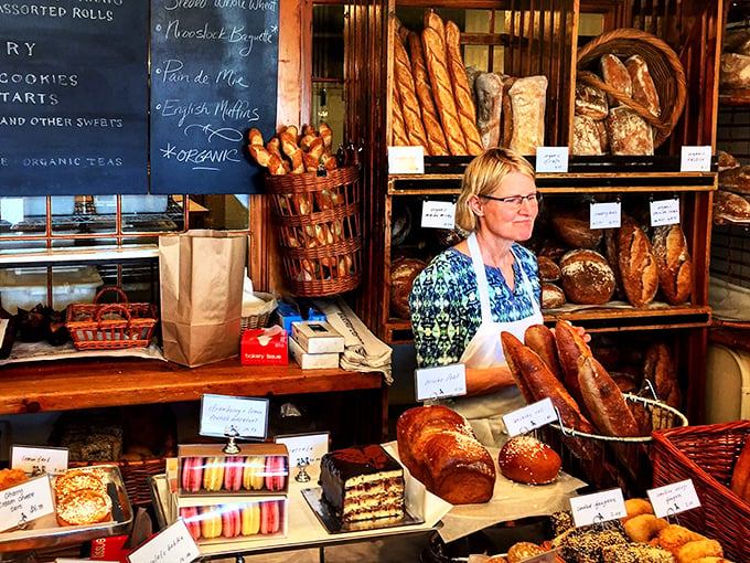 The wizard behind the curtain! This baker's skilled hands are the secret ingredient in every delectable morsel.