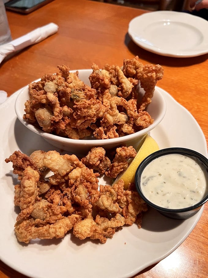 Fried clam nirvana! These golden nuggets are crunchier than your granola-obsessed neighbor's breakfast. Dip and enjoy!