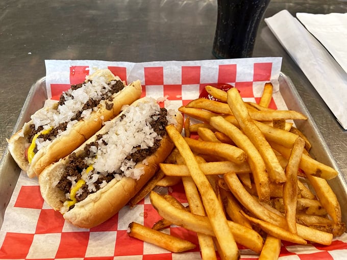 The dynamic duo of comfort food: Coney dogs and fries. It's like Batman and Robin, but with more cheese and less spandex.