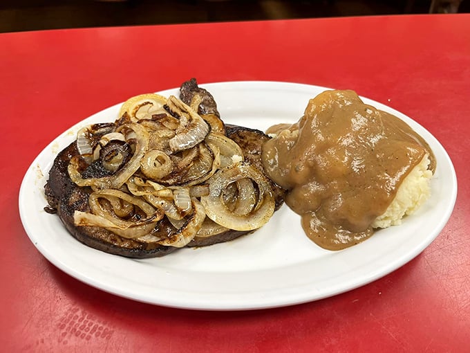 A steak that would make Ron Swanson proud. Paired with those caramelized onions, it's a meat lover's dream come true.