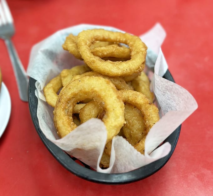 Golden rings of happiness! These onion rings are crispier than a Michigan winter morning and twice as satisfying.