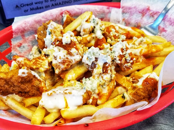 Buffalo fries: where comfort food meets kick! Topped with blue cheese and ranch, it's like your taste buds are doing the cha-cha slide.