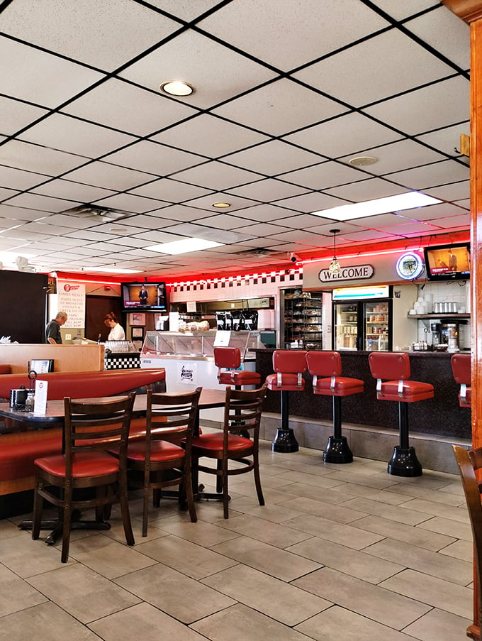 Step into a diner straight out of a Norman Rockwell painting, where red vinyl and checkered patterns reign supreme.