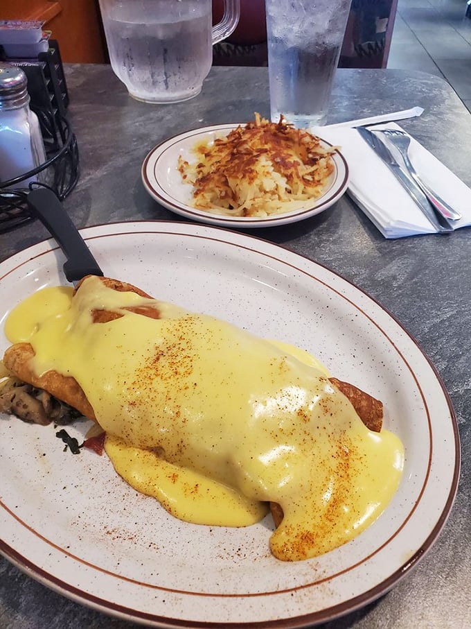 Breakfast of champions! This Monte Cristo crepe and golden hashbrowns are like a morning hug for your taste buds.