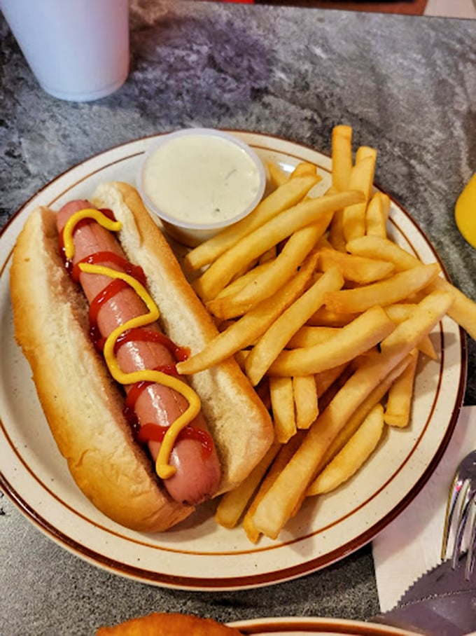 The classic combo that's more iconic than Batman and Robin: a Coney dog and fries, ready for their close-up.