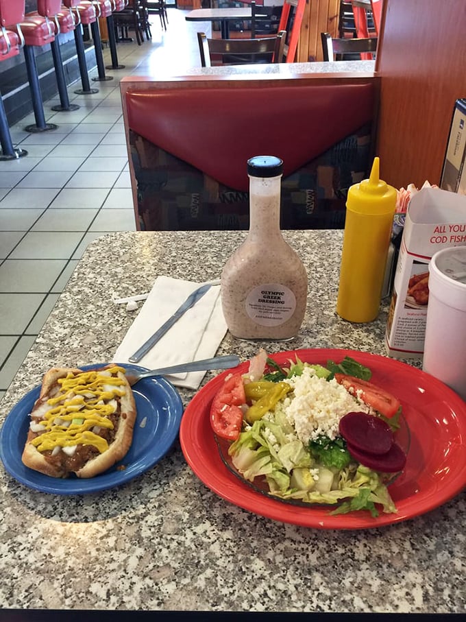 A tale of two plates: the wild and free loose Coney meets its sophisticated cousin, the Greek salad. A culinary odd couple!