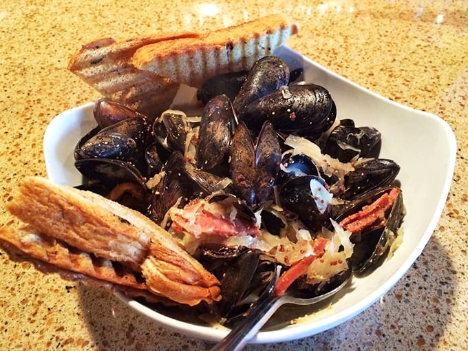 A seafood symphony in a bowl! These mussels and kielbasa are like the Lennon and McCartney of appetizers – unexpected, but pure harmony.