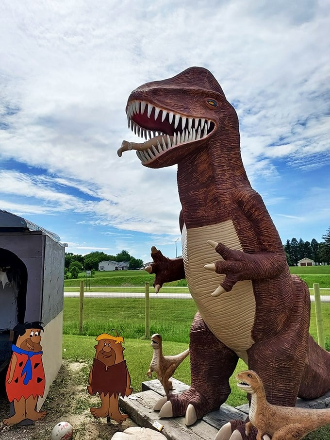 Jurassic Park meets The Flintstones in this prehistoric playground. Who knew T-Rex had such a flair for posing with cartoon cavemen?