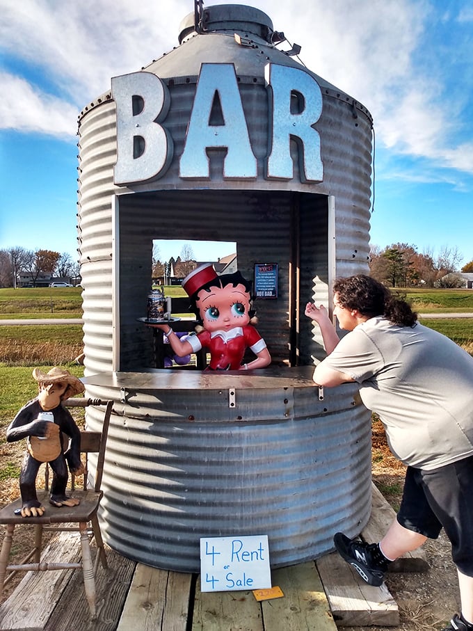 Step right up to the quirkiest bar this side of the Mississippi! It's like a carnival and a grain silo had a baby, and Betty Boop's running the show.