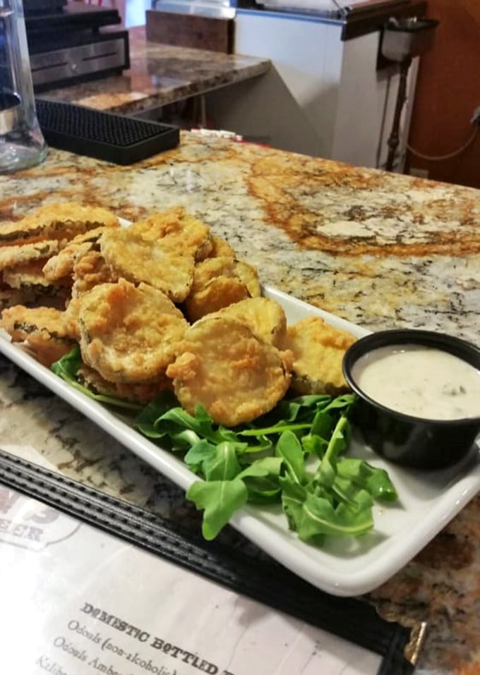 Behold, the golden glory of Milton's famous fried pickles! These crispy delights are the Meryl Streep of appetizers – versatile, beloved, and always delivering a stellar performance.