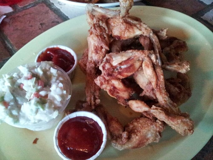 A plate that's got legs... frog legs, that is! Paired with creamy coleslaw, it's a combo that'll make your taste buds jump for joy.