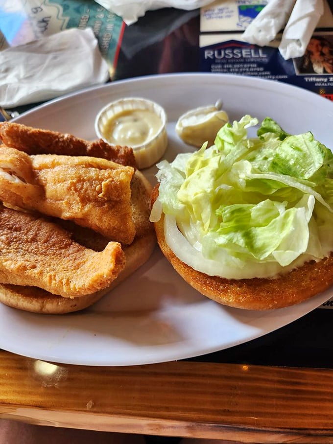 The catch of the day, sandwiched! This perch burger proves that sometimes, the best things in life come between two buns.