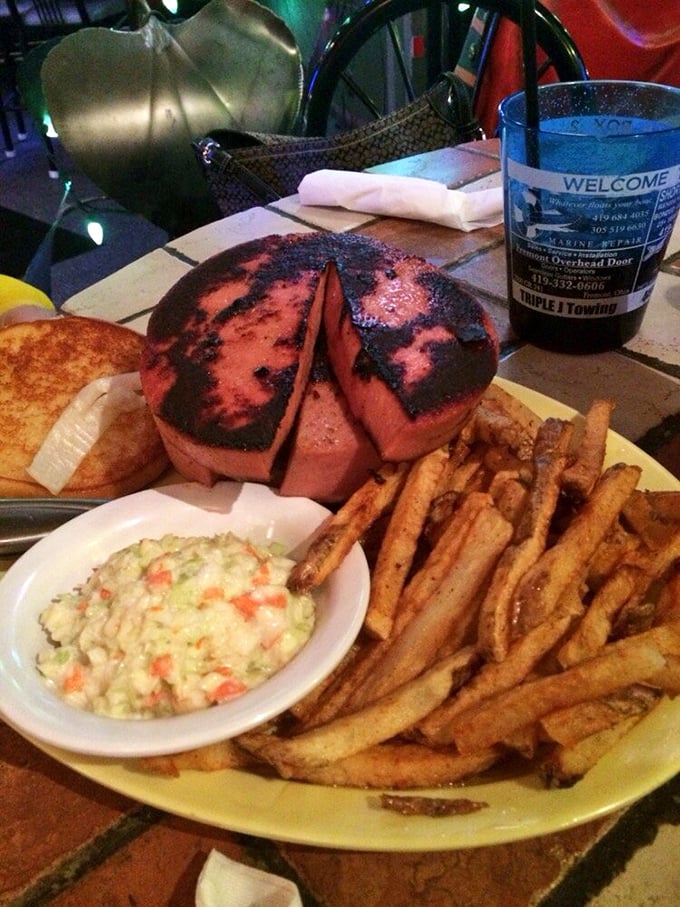 Not your average sandwich! This fried bologna behemoth is a nostalgic nod to Midwest comfort food, elevated to epic proportions.