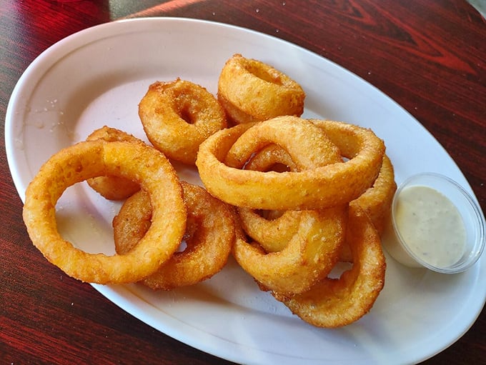 Rings of joy! These golden onion rings are the perfect catch for those who like their sides with a crispy crunch.