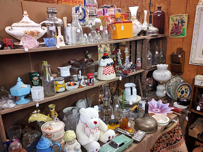 It's like someone took a snow globe of American history and shook it vigorously. From teddy bears to teapots, this shelf is a microcosm of bygone eras.