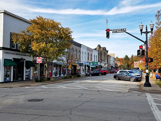 Autumn in America: Fall colors paint the historic district in warm hues, creating a scene worthy of a Hallmark movie. It's the kind of street that makes you want to sip pumpkin spice everything.