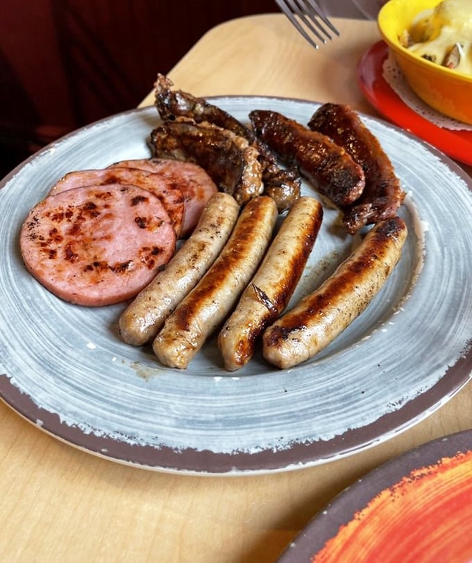 Sausage fest, anyone? This plate is bringing home the bacon… and then some. Vegetarians, avert your eyes!