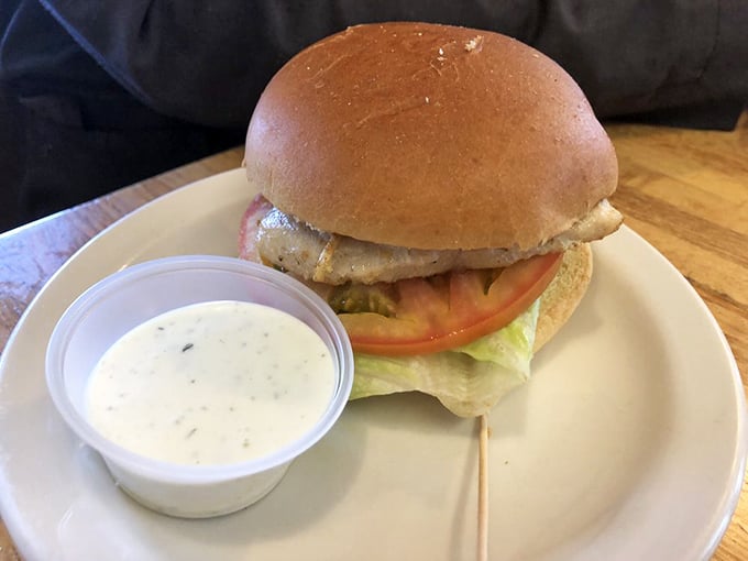 This sandwich isn't just a meal, it's an edible work of art. Stacked higher than a Jenga tower, it's a testament to the time-honored tradition of "more is more."